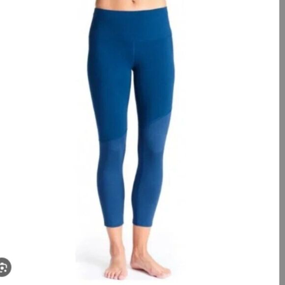 oiselle Pants - Like New! Oiselle Blue Teal Leggings with Mesh Panel Pockets in Size 4